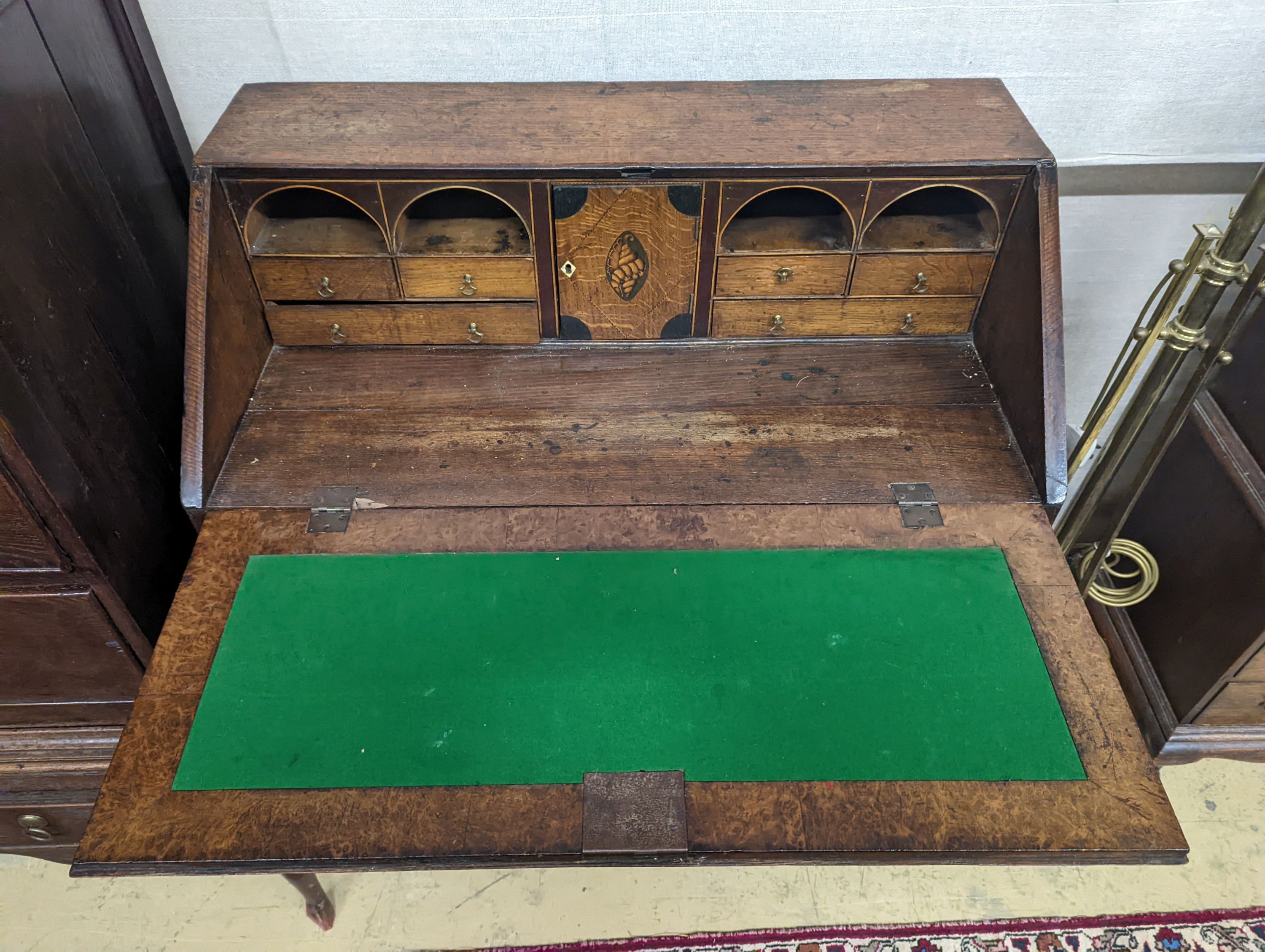 A George III inlaid oak bureau, width 85cm, depth 47cm, height 101cm